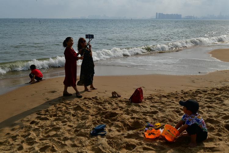 海口市假日海滩水温?(假日沙滩收费吗)-图3 海口市假日海滩水温?(假日沙滩收费吗)-图3