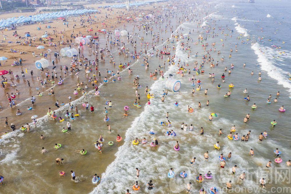 青岛哪个沙滩可以游泳?黄岛海水浴场冲水收费-图3 青岛哪个沙滩可以游泳?黄岛海水浴场冲水收费-图3