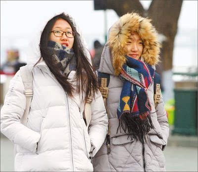 今天天气适合穿羽绒服吗？明天天气情况怎么样